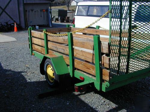 4 x 10 feet farm trailer 2 feet side rails jd green