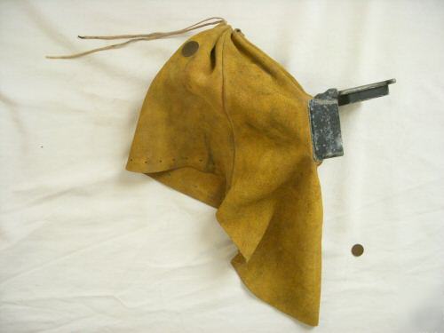 Old leather welder's hood goggles burning steampunk man
