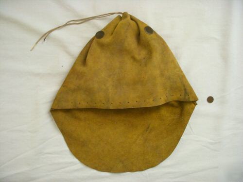 Old leather welder's hood goggles burning steampunk man