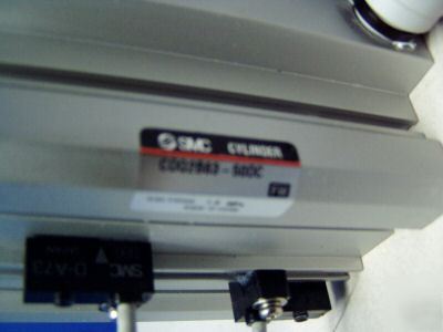 Smc cushion cylinder m/n: CDQ2B63-50DC - used