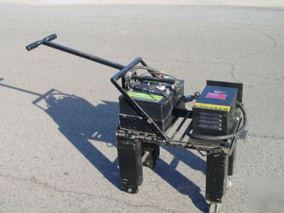 Tci mfg. battery tugger cart and accessories