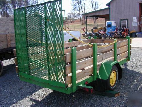 4 x 10 feet farm trailer 2 feet side rails jd green