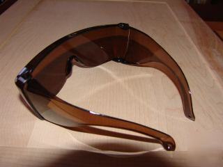 Golden brown safety sunglasses fits over your glasses